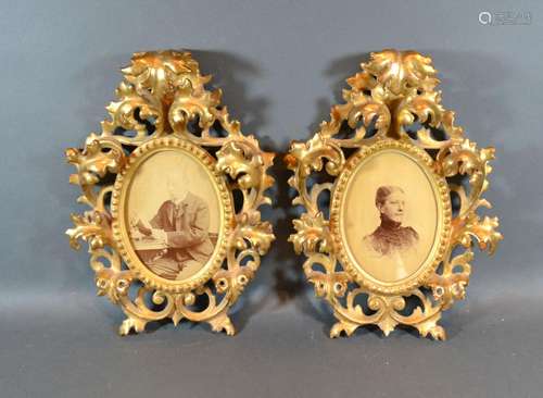 A Pair of Late 19th Early 20th Century Gilt Wood Oval Picture Frames of Rocco form with pierced