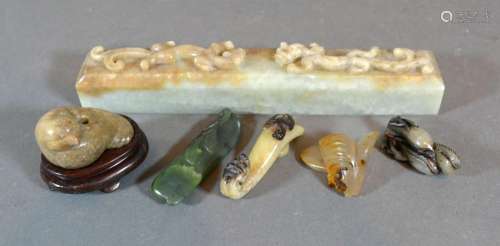 A Chinese Jade Scroll Weight 19cm long together with five Chinese small carvings