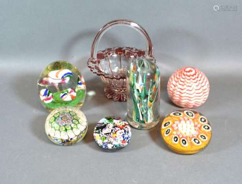 A Millefiori Glass Paperweight together with five other similar glass paperweights and a small glass