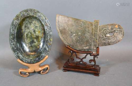 A Chinese Jadeite Oval Small Dish with hardwood Stand together with another similar on hardwood