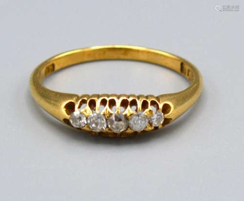 A 18ct Yellow Gold Diamond Ring set with five diamonds within a pierced setting, Size P, 2.8 grams