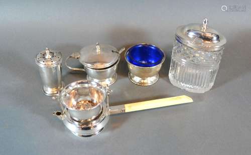 A Birmingham Silver Cruet Set together with a Birmingham silver tea strainer and a silver mounted