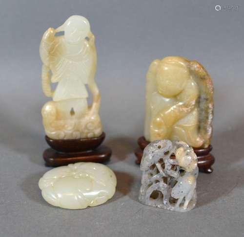 A Chinese Jade Carved Model in the Form of a Figure 8cm tall together with three other similar