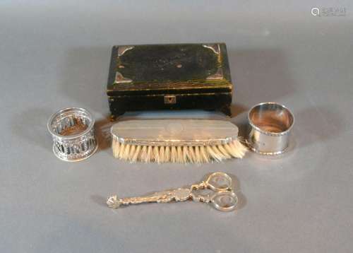A Pair of Georgian Silver Sugar Snips together with two napkin ring, a silver backed brush and a