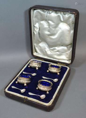 A Set of Four Birmingham Silver Salts with spoons within fitted lined case