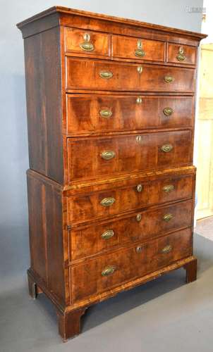 A George II Walnut Chest on Chest, the moulded cornice above three short and six long graduated