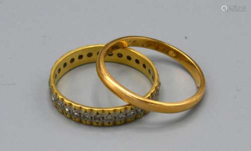 An 18ct. Gold Wedding Band, 2.2 gms together with an 18ct. gold diamond eternity ring, 2.5 gms