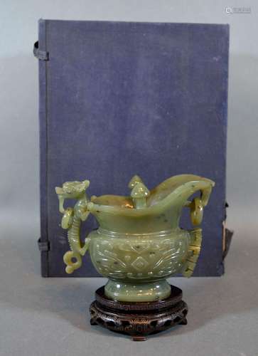 A 20th Century Chinese Jade Model in the Form of a Jug with hardwood stand and original box 11cm