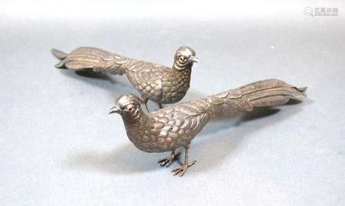 A Pair of Mexican White Metal Models in the form of Peacocks with Cabochon Stone Eyes 28cm long