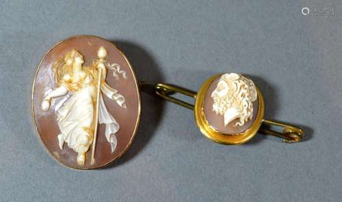 A Oval Cameo Brooch depicting a classical female within yellow metal mount together with another