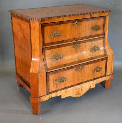 An 18th Century Dutch Satinwood Marquetry Inlaid Commode, the crossbanded top with central oval