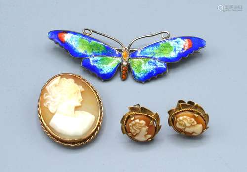 An Oval Cameo Brooch within 9ct. gold mount together with a pair of 9ct. gold cameo ear studs and