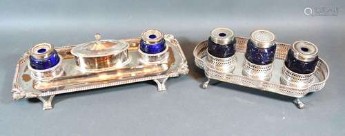 A 19th Century Silver-plated Ink Stand with three blue glass bottles together with another similar