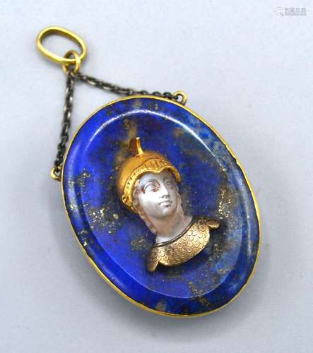 A Late 19th Century Lapis Lazuli Pendant of oval form mounted with a rock crystal figurehead 2.5 x 3