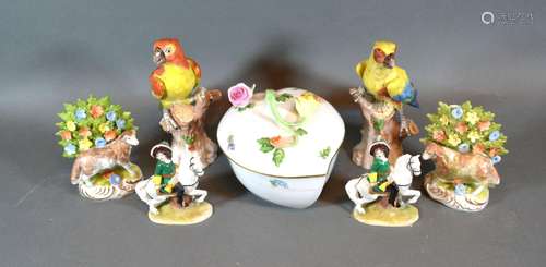 A Pair of German Porcelain Models in the form of birds decorated in polychrome enamels and