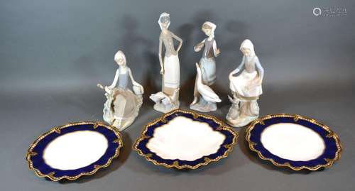 A Lladro Figurine with Lady and Rabbit together with three other similar Lladro figures and three