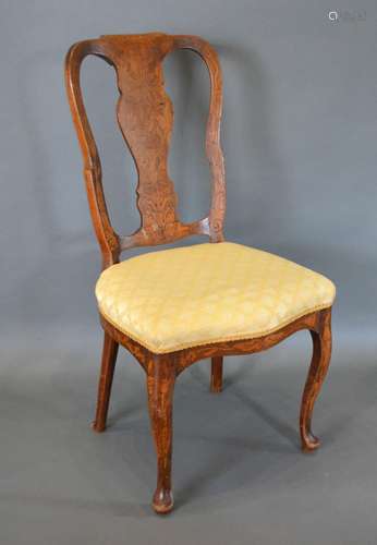 An Early 19th Century Dutch Marquetry Side Chair with an inlaid splat back above a serpentine padded