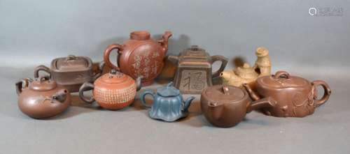 A Chinese Terracotta Teapot together with various other similar matt glaze teapots