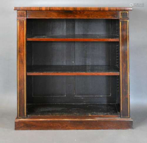 A Regency Rosewood and Brass Inlaid Dwarf Bookcase, with open shelves raised upon a plinth, 87 cms