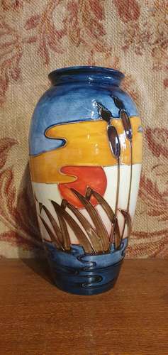 A Moorcroft Oviform Vase Reeds at Sunset Pattern tube lined 25cm tall