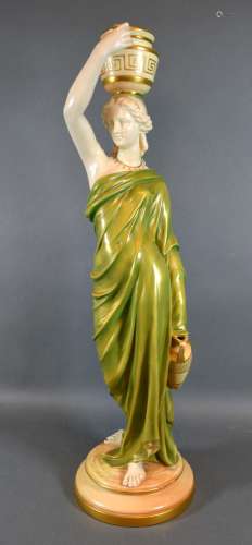 A Royal Worcester Porcelain Figure 'The Water Carrier' puce mark to base and numbered 125, 51 cms