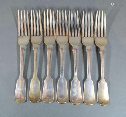 A Set of Seven Victorian Silver Table Forks by George Adams with fiddle pattern handles, dates