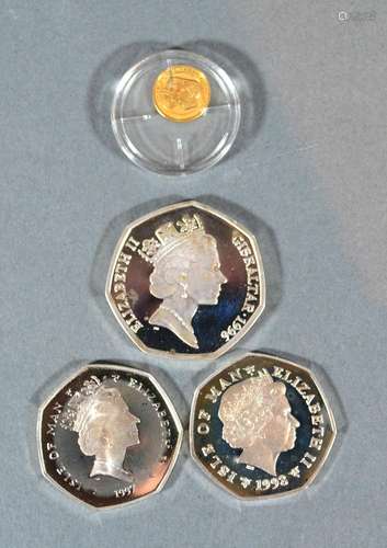 A 14ct. Gold Commemorative Small Coin 'The Year of the Three Kings' 0.5 gms. together with three