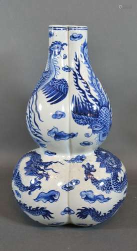 A 19th Century Chinese Porcelain Gourd Vase of Triform decorated in underglaze blue with serpents,