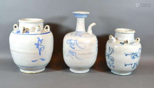 A 19th Century Chinese Wine Vessel decorated in underglaze blue 25cm tall together with another