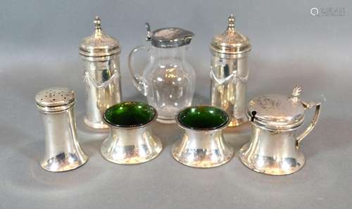 A Pair Of Sheffield Silver Peppers together with a Birmingham Silver four piece condiment set