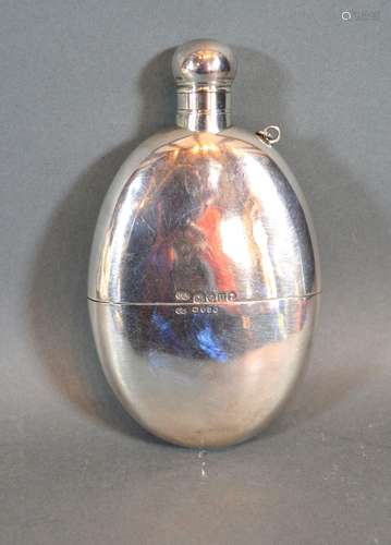 A Victorian Silver Hip Flask of Oval Form with removable cup London 1875 Maker George Adams 7oz