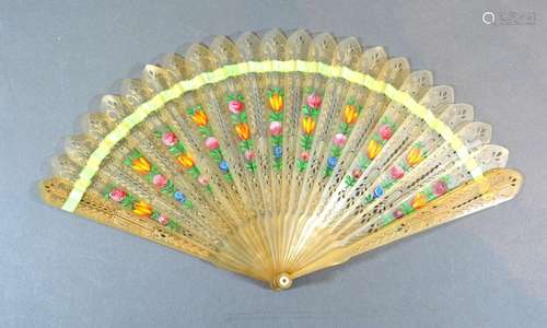 A Horn Brise Fan with Pierced and Carved Sticks hand painted with roses and with carved and