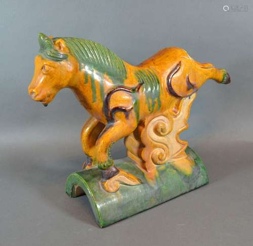 A Chinese Roof Tile in the form of a Tang Horse 32cm long