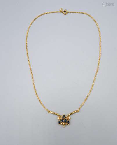 An 18ct Gold Necklace the pendant set with five oval sapphire and six diamonds with fine link chain,