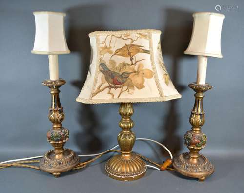 A Pair of Gilded Table Lamps together with another similar