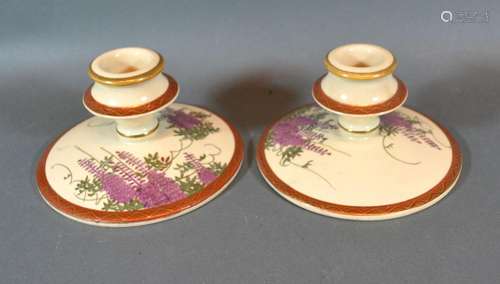 A Pair Of Satsuma Squat Candlesticks, 12cms diameter