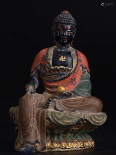 A GLASS SAKYAMUNI BUDDHA STATUE