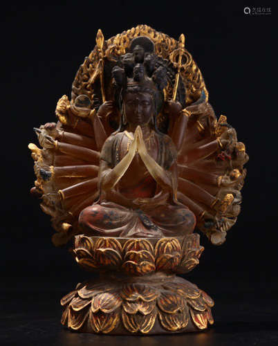 A GLASS GUANYIN BUDDHA STATUE