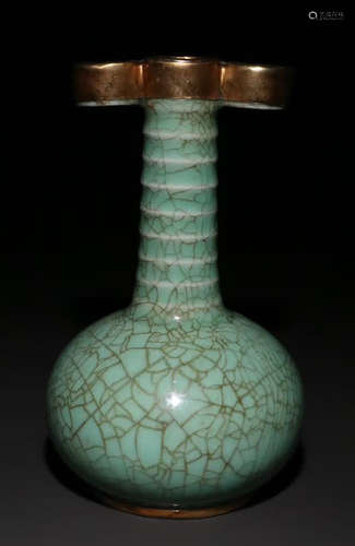 A JUNYAO GREEN GLAZE VASE EMBEDDED WITH GOLD