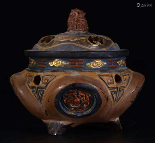 A GLASS CENSER CARVED WITH BEATS