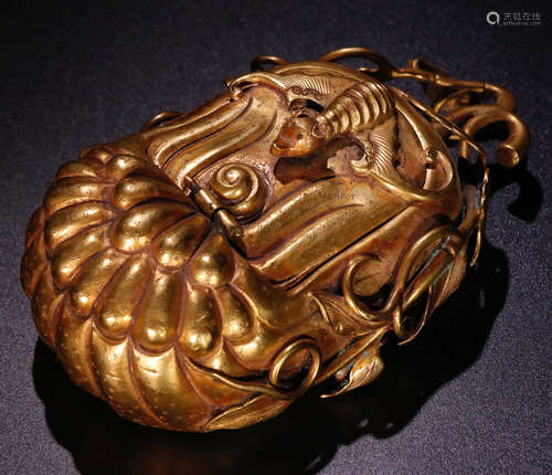 A GILT BRONZE BOX SHAPED WITH CHAYOTE