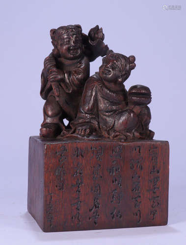 A CHENXIANG WOOD SEAL CARVED WITH FIGURE