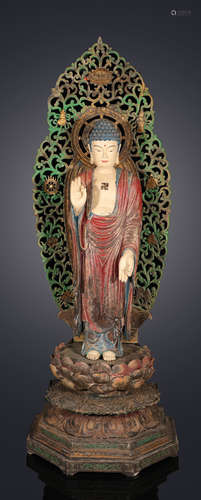 A CAMPHOR WOOD BUDDHA STATUE