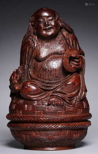 A BAMBOO FIGURE STATUE