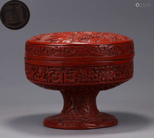 A RED LACQUER CONTAINER CARVED WITH LANDSCAPE PATTERN