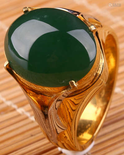 A JADEITE AND SILVER RING