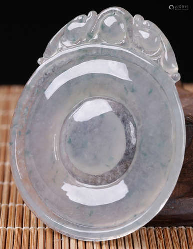 AN ICEY JADEITE PENDANT