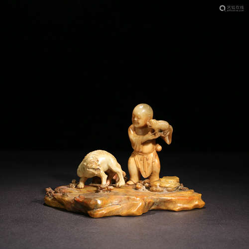 A Chinese Shoushan Stone Carved Boyand beast Ornament