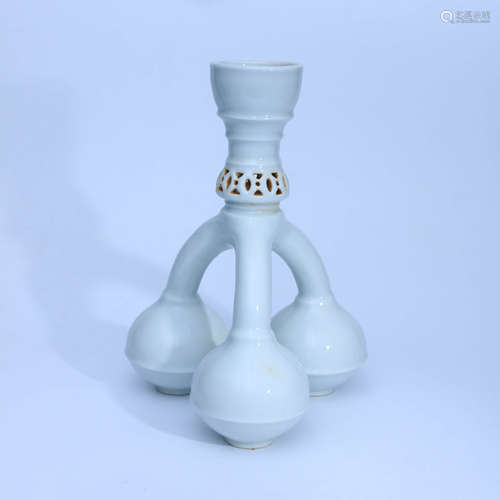 A Chinese Sweet White Glaze Carved Porcelain Three-legged candlestick