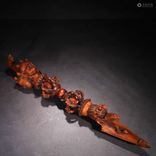 A Chinese Rosewood Carved Buddhist Instrument